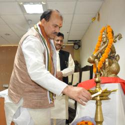 Prof Kedarprasad Paroha Lighting the lamp